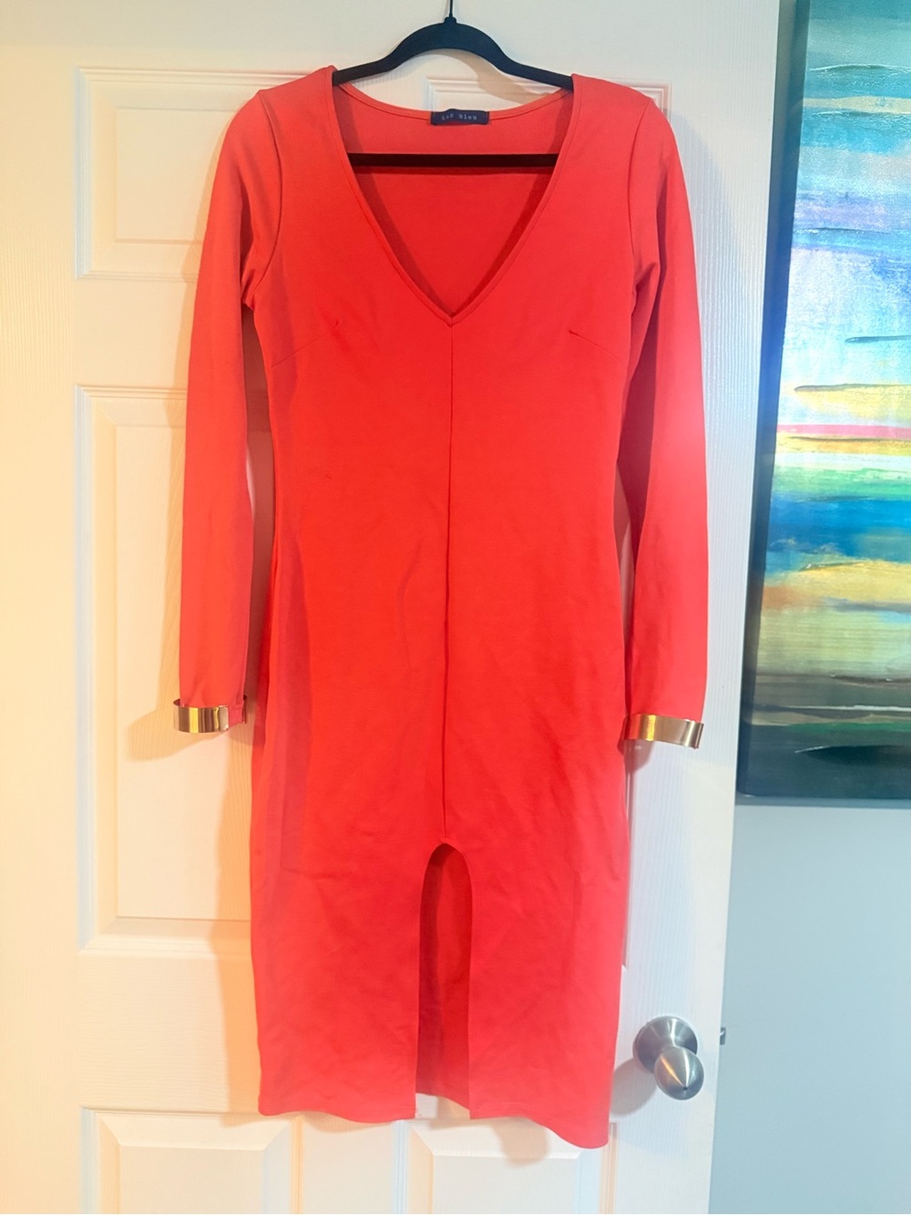Boutique Long Sleeve V-Neck Sheath Dress with Gold Cuff Detail and front split!